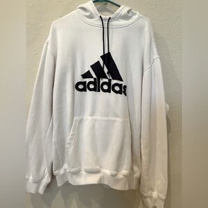 White and black pullover Adidas sweatshirt.
